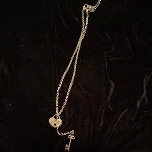 Vintage silvertone key and heart necklace.